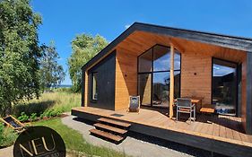 Werder Chalet -- Grosses Sonnendeck -- Strand 150M I Sauna I Ekamin I Bis 8 Pers I Meerblick I By 